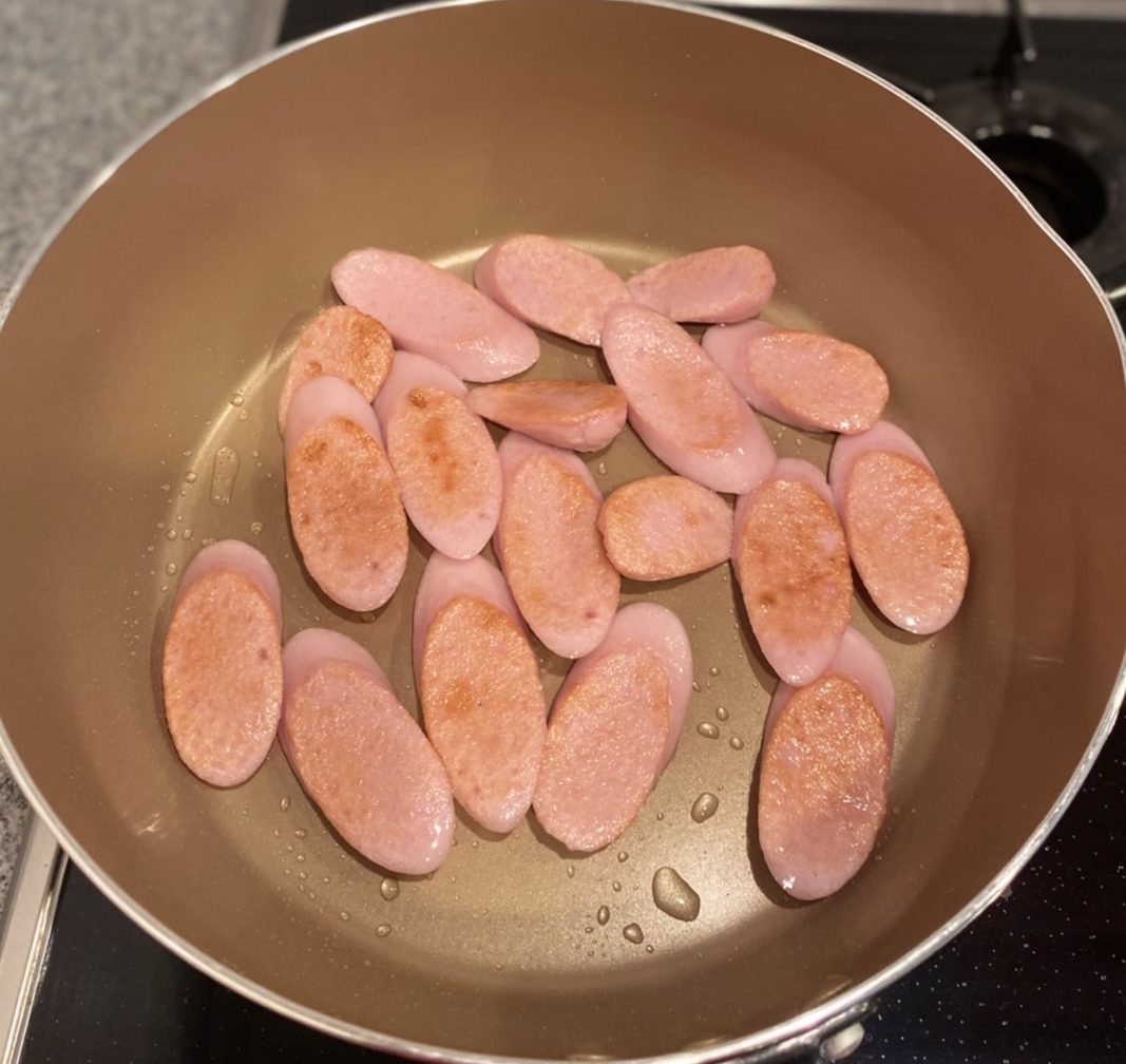 材料を炒める（裏返す）